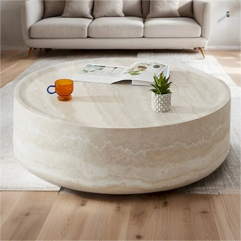 Table basse ronde robuste en fibre de verre avec grand espace de rangement (31,49 €).